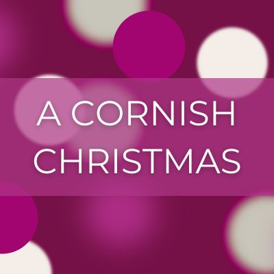 Pink bokeh effect with text 'A Cornish Christmas'