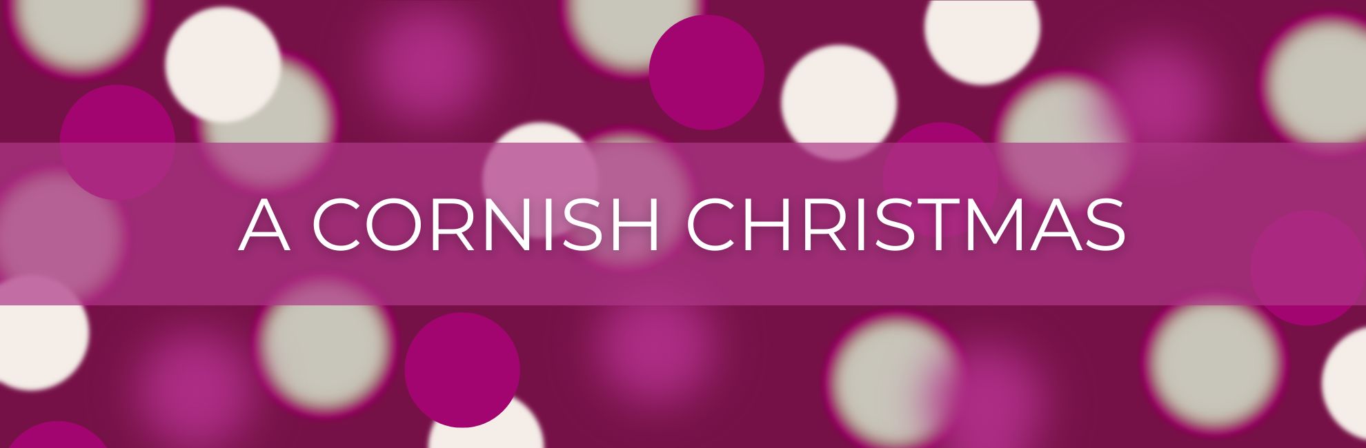 Pink bokeh effect with text 'A Cornish Christmas'